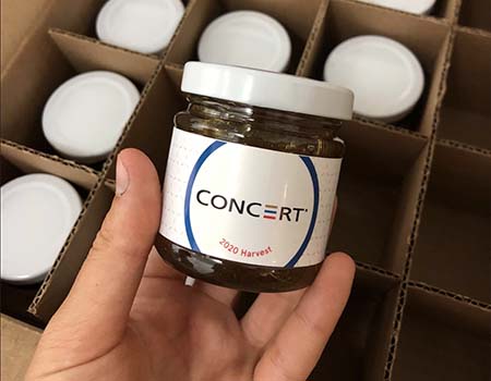 A jar of honey with a custom label