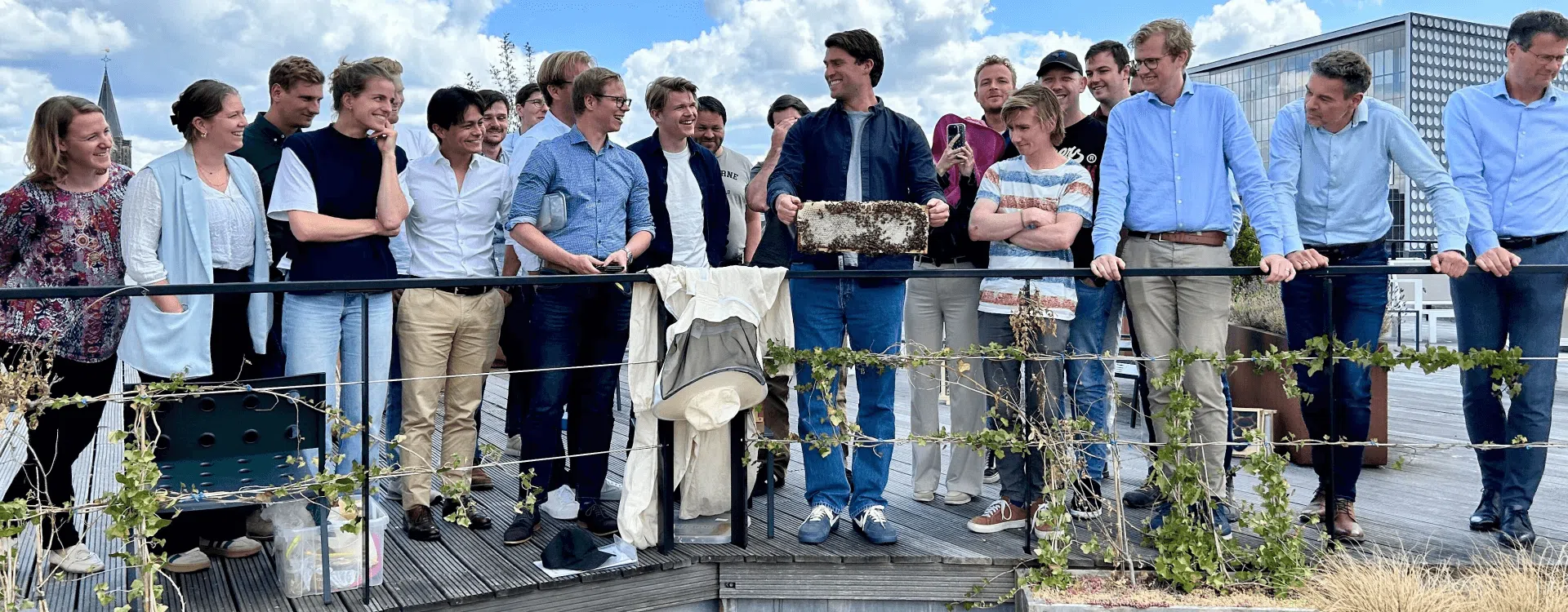 Tenants engaging with nature-based amenities on a rooftop