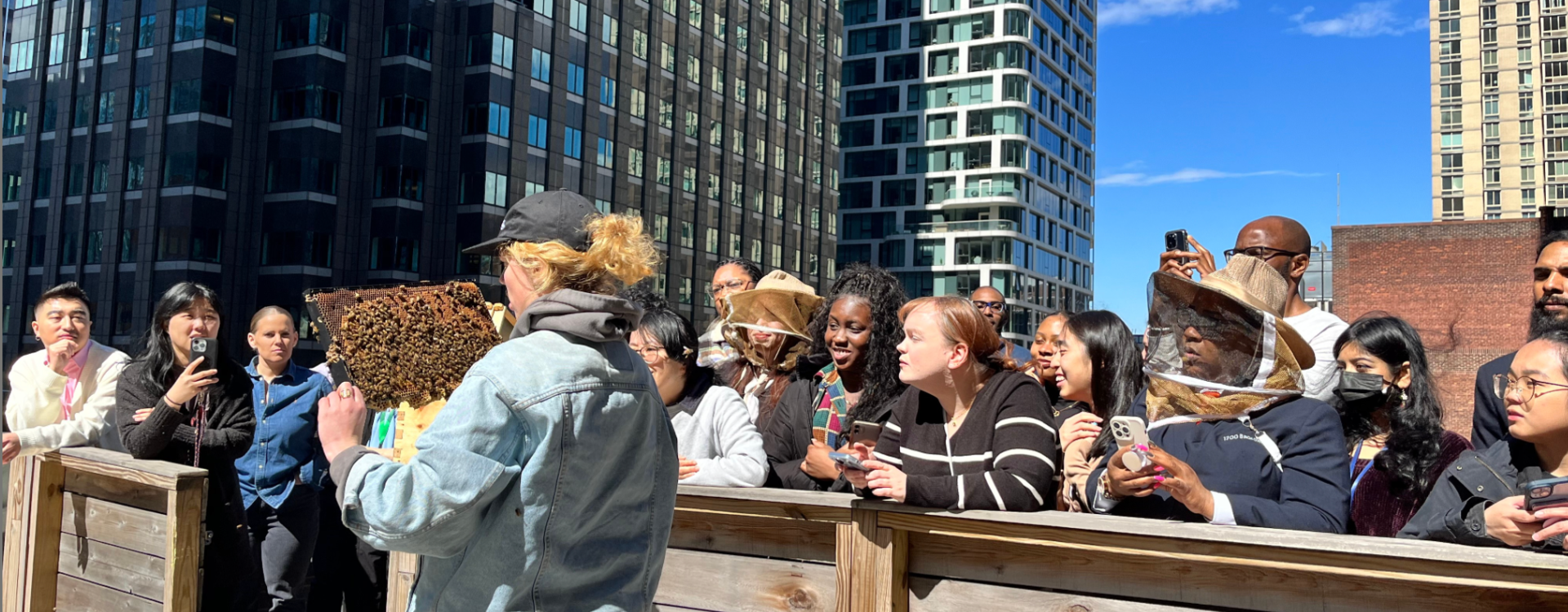 Urban beekeeping program on commercial office building rooftop as unique tenant amenity and ESG initiative